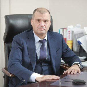 Николай