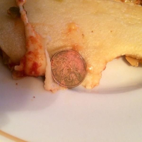 Монета 50 копеек в пицце "Торговая Площадь".
