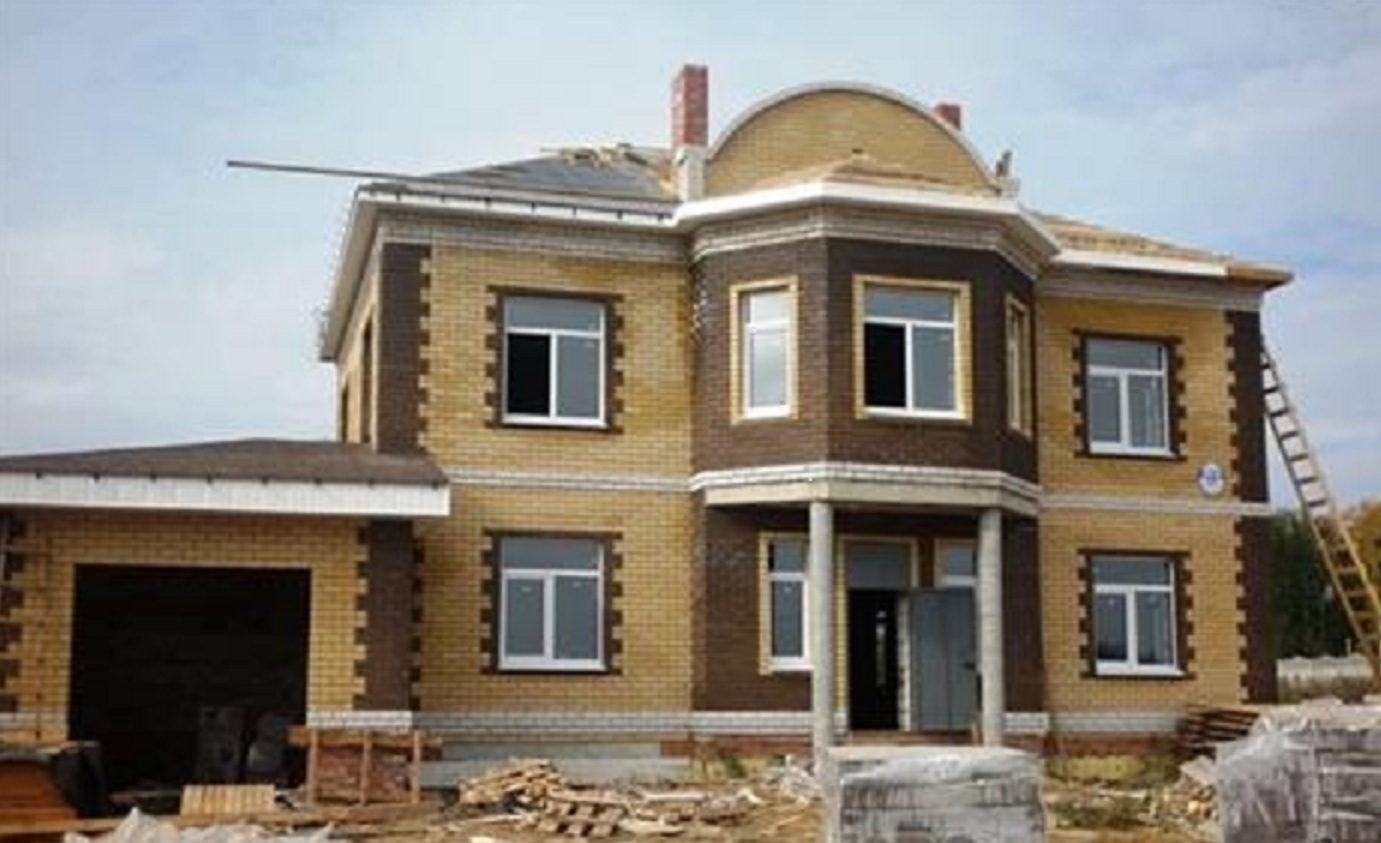 Кирпичный дом после реконструкции